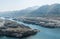 High angle panoramic landscape view of beautiful river Narmada with Statue of Unity sign board across the river, in Kevadia,