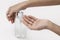 High angle person using liquid soap. High quality and resolution beautiful photo concept
