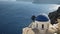 High angle shot of a blue domed church at Oia, Santorini