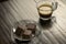 High angle shot of cookies on a plate and a glass of espresso