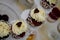 High angle shot of decorative cupcakes on a dessert tabl