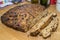 High angle shot of a delicious raisin pie on a wooden surface