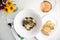 High angle shot of a gourmet truffle pasta dish near a plate of bread at a restaurant