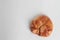 High angle shot of a loaf of homemade bread isolated on a white surface