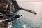 high-angle shot of Manarola coastline, stones in the sea