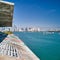 High-angle shot of the Miami Marine Stadium with the Miami Skyline in the background on a sunny day