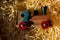 High angle shot of an old wooden train toy on paper shred under the lights