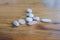 High angle shot of pebble stones on a wooden table
