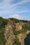 High angle shot of a scenic rocky shore cliff of Opal lake in Sandvig, Bornholm