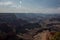 High angle shot of the stunning scenery of the Grand Canyon in the USA with beautiful white clouds