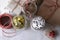 High angle shot of three mason jars with gift wrapping supplies