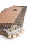 High angle vertical studio shot of vintage, old wooden zither isolated on white background. Detail of zither mechanics