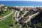 High angle view across the pathways of an oceanside with luxury resorts in Los Cabos, Mexico