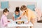 high angle view of adorable multiethnic children drawing