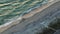 High angle view of Blind Pass beach on Manasota Key in Englewood, USA. People enjoying vacations time swimming in ocean