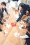 high angle view of businesspeople assembling puzzle