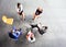 High angle view of colleagues planning while sitting during meeting at office