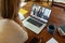 High angle view of diverse businesswoman discussing with coworkers over videocall on laptop