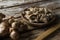 High angle view of dried gingers in plate on weathered table