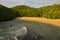 High angle view on the lagoon sand beach Kasap with green hills