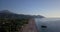 High angle view on a long wide beach and massive mountains near Cirali, 4k