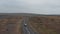 High angle view majestic landscape panorama of iceland countryside in cloudy day with car driving ring road. Top view of