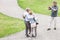 High angle view of man photographing friends at park