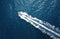 High angle view of a motorboat speeding on the ocean
