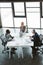 high angle view of professional multiethnic business people working together at table