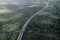 High angle view of road in countryside surrounding by trees