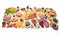 High angle view of a selection of food including ham, salami, cheese, sausage, olives, vegetables and fruit on a white background.