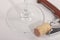 High angle view with shallow depth of field of a glass of red wine with a sommelier tools