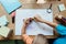 High angle view of siblings playing with toy cars on a paper road