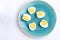 High angle view sliced eggs on plate