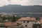 High angle view of the town of Brolo, Piedmont, Italy. On the background lay Orta lake and the city of Omegna