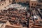 High-angle view of the traditional tannery vats on a sunny day in Fes