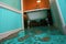 high angle view of water spilling onto bathroom floor