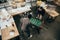 high angle view of young architects playing table football in office full of