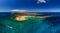 High Aspect Aerial Panorama of the Tropical looking island of Lobos Fuerteventura