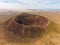 High aspect close up panoramic aerial view of Volcan Calderon Hondo volcano near Lajares in Fuerteventura