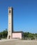 High bell tower on the town square of Lio Piccoli a small villag