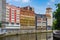 High Bright multi colored houses apartment buildings along Nervion River, Bilbao, Spain. Colorful architecture