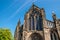 High Catholic temple, spire, tower, on sky background