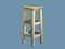 High chair without backrest made of wood on a light gray background