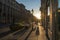 High class shopping mile Maximilianstrasse in Munich illuminated by the sun while golden hour