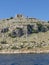 High cliff in Kornati islands Croatia with castle