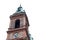 High clock tower with green roof of the basilica Saint Wenceslas church smichov in the style of the Renaissance against the sky