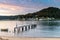 High Cloud Sunrise over the Bay, Boat and Old Wharf