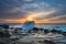 High Cloud Sunrise Seascape from Rock Platform