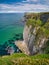 High coastal cliffs on the Antrim Coast, near Giant`s Causeway, Northern Ireland.